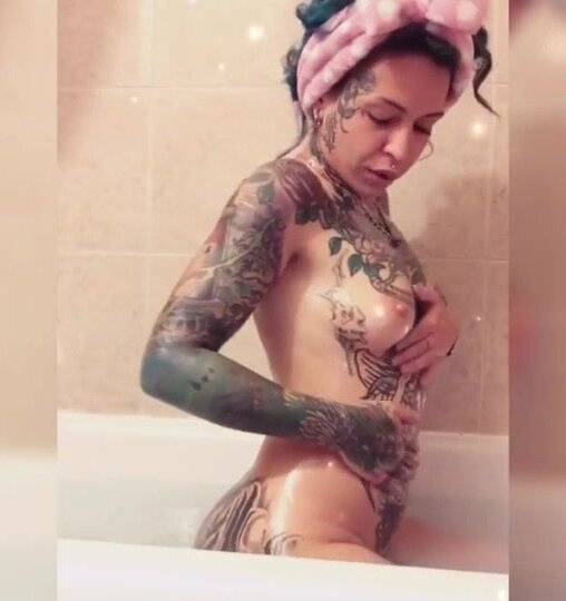 Inked girl bathtub oil play with dildo on fanstube.video